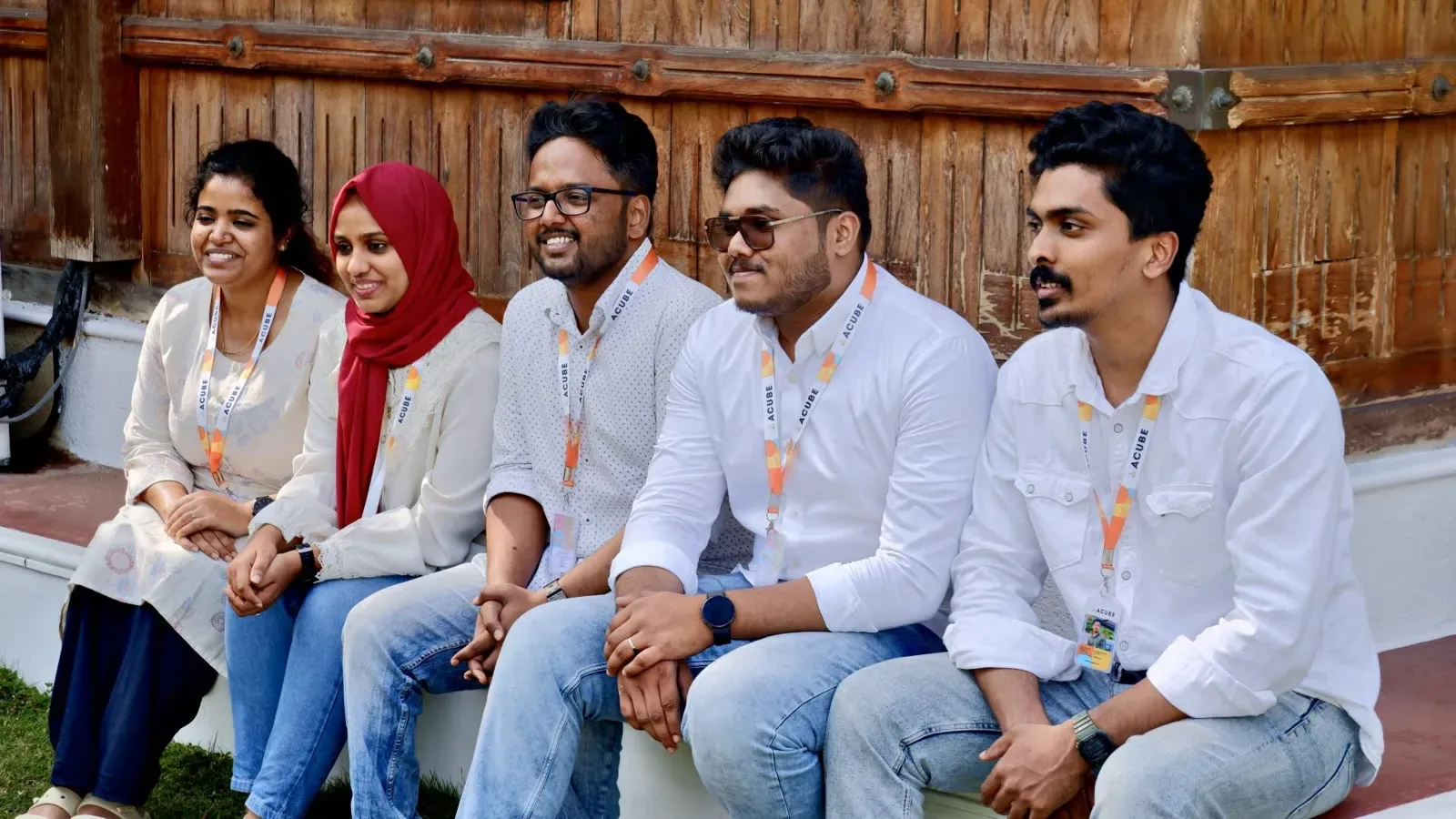 Colleagues smiling on the anniversary