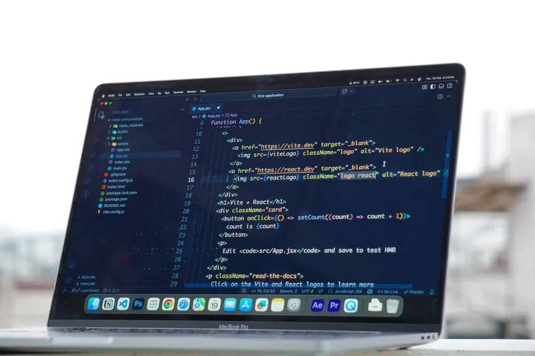 Hire React & Node Developers — Modern Full-Stack JavaScript — javascript react developer coding laptop, by Acube Innovations, an ERPNext & software development company in India